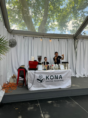 Kona Coffee Roasters espresso bar at an outdoor tent event